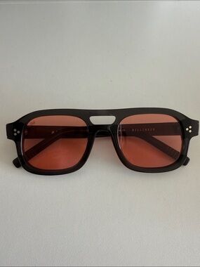 Akila Dillinger Women's Black Frame Sunglasses with Red Lenses